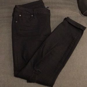 Never worn distressed black skinny jeans